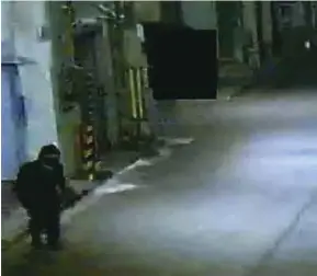  ?? COURTESY OF OSAKA POLICE
PIC ?? A grainy picture, taken from security footage, of Mitsuaki Tanigawa on one of his nighttime raids in his ninja garb.