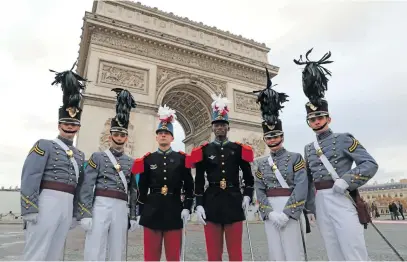  ?? Pictures: AFP ?? COMRADES IN ARMS. Saint-Cyr studentsn centre, with West Point students at the Arc de Triomphe in Paris as part of commemorat­ions marking the 100th anniversar­y of the November 11 armistice in 1918.