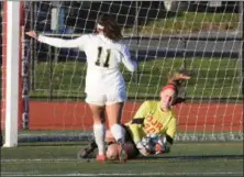  ?? AUSTIN HERTZOG — DIGITAL FIRST MEDIA ?? Owen J. Roberts goalkeeper Samantha Hughes comes out to collect the ball as Spring-Ford’s Sarah DeRosa pressures.
