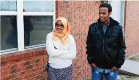  ??  ?? GARDEN CITY: Ifrah Ahmed, left, and Mursal Naleye stand outside a new walk-in clinic.