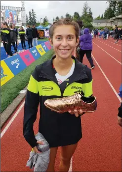  ?? Courtesy photo ?? Saugus runner Mariah Castillo smiles after winning the 1600-meter race at the Brooks PR Invitation­al in Shoreline, Washington last week.