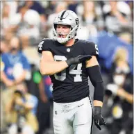  ?? Chris Unger / TNS ?? Defensive end Carl Nassib of the Las Vegas Raiders reacts after making a tackle for a loss of yardage during the second quarter against the Baltimore Ravens at Allegiant Stadium on Monday in Las Vegas. The Raiders won 33-27 in overtime.