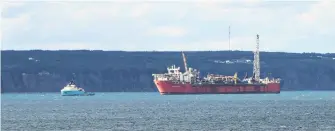  ?? TELEGRAM FILE PHOTO ?? The Terra Nova floating production, storage and offloading (FPSO) vessel in Conception Bay with a supply ship.