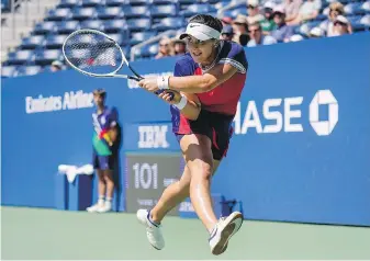  ?? THE ASSOCIATED PRESS ?? Bianca Andreescu returns a shot to Greet Minnen during their third round game at the U.S. Open in New York on Saturday.