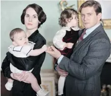  ?? Nick Briggs/carnival Film ?? Widow Lady Mary (Michelle Dockery) leans on her widowed brother-in-law Tom (Allen Leech) as they work together to run the Abbey.