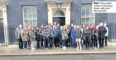  ??  ?? Visit Trinty pupils visited 10 Downing Street, with Lord McAvoy (left)