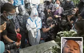  ?? — AP/Reuters ?? A mother’s love: Nasino sprinkling holy water on River’s coffin during funeral rites in Manila, while a photograph of River (inset) is placed beside her coffin before she is buried.