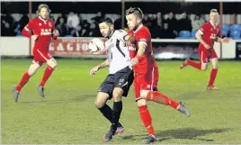  ??  ?? Ashley Ruane, left, was the main threat for Cefn Druids against Cardiff Met