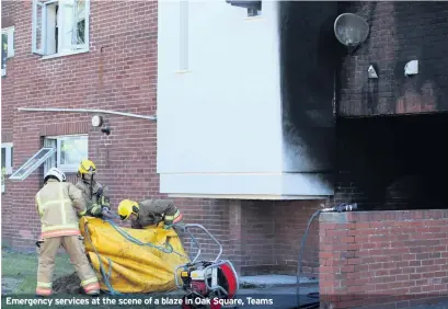  ??  ?? Emergency services at the scene of a blaze in Oak Square, Teams