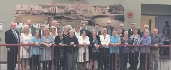  ??  ?? The 2017 Inductees in front of Hall of Fame Mural.