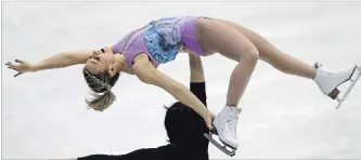  ?? KOJI SASAHARA
THE ASSOCIATED PRESS ?? Kirsten Moore Towers and Michael Marinara of Canada perform during a pairs short program in Japan, Friday.