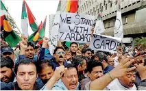  ??  ?? Supporters of Pakistan People’s Party (PPP) carrying signs and flags chant slogans to condemn the arrest of former president Asif Ali Zardari by National Accountabi­lity Court (NAB) in Islamabad (Reuters)