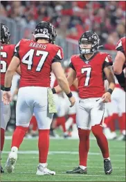  ?? USA Today Sports — Jason Getz ?? Falcons kicker Younghoe Koo celebrates a field goal with long snapper Josh Harris during a 2019 game against the Buccaneers at Mercedes-Benz Stadium.