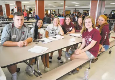  ?? Leslie Hutchison/ Hearst Connecticu­t Media ?? Student council senior class members helped freshmen find their way around during orientatio­n day at Torrington High School. Clockwise from left are: Danny Scheerer, Melissa Tran, Alyssa Kreuzer, Alyssa Maraia, Emma Mercoglian­o, and front row from right, Caroline Kearney and Jessica Power.