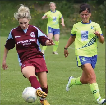  ??  ?? Ferns United captain Leona Breen controls the ball as Adamstown’s Danielle Martin keeps a close watch.