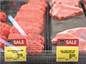  ?? PATRICK T. FALLON/AFP VIA GETTY IMAGES ?? Beef prices and veal prices are down almost 4% compared with last year.