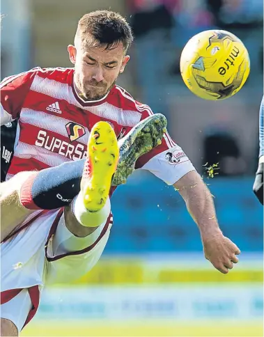  ?? Pictures: SNS Group. ?? Above: Craig Wighton challenges Hamilton’s Scott McCann: below: Dundee’s Tom Hateley is put under pressure by Accies attacker Dougie Imrie.