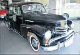  ??  ?? Top: A beautiful Mercedes-Benz 190SL will go under the hammer in Cape Town. A 1952 Opel Kapitan, left, will be one of many vehicles auctioned at the George Old Car Show.