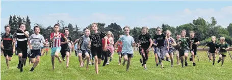  ??  ?? Top left: Racing at Wingatui on Melbourne Cup day in November 2020.
Top right: This year’s Waikouaiti Racing Club meeting is at Wingatui on January 16.
Above: Children racing at the Waikouaiti Races in 2019.