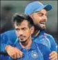  ?? AFP ?? Yuzvendra Chahal celebrates Glenn Maxwell’s wicket.