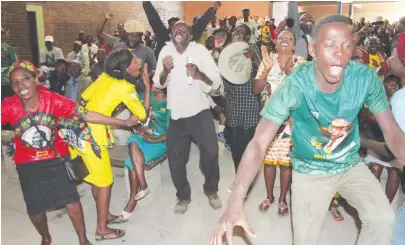  ??  ?? Ecstatic ZANU-PF supporters dance during a recent party meeting in Sakubva.