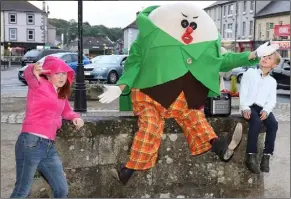  ??  ?? Humpty Dumpty and some local children at the Streams of Bunclody Festival.