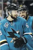  ?? IMAGES EZRA SHAW/GETTY ?? Brenden Dillon and Melker Karlsson of the San Jose Sharks celebrate after they beat the St. Louis Blues 5-2 in Game 6 of the Western Conference Final on Wednesday in San Jose, Calif.