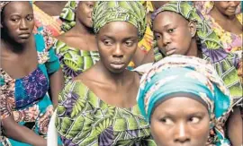 ?? Sunday Aghaeze PGDBA & HND Mass Communicat­ion ?? SOME of the “Chibok girls” rescued in May, part of a group of 276 students whose plight captured global attention and set off the “Bring Back Our Girls” movement.