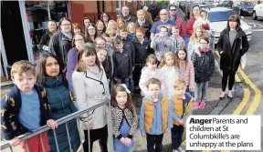  ??  ?? Anger Parents and children at St Columbkill­e’s are unhappy at the plans