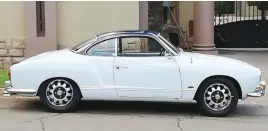  ?? ?? WHAT A LOOKER. This 1967 Karmann Ghia is part of Tromp’s collection.