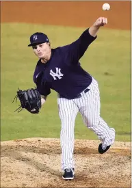  ?? Gene J. Puskar / Associated Press ?? New York Yankees pitcher Justin Wilson delivers during a spring training game against the Philadelph­ia Phillies in Tampa, Fla., on March 19.