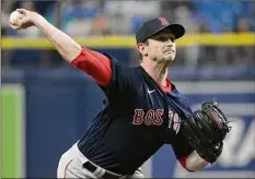  ?? Phelan M. Ebenhack / Associated Press ?? Boston pitcher Garrett Whitlock struck out seven in four innings in his first major league start Saturday.