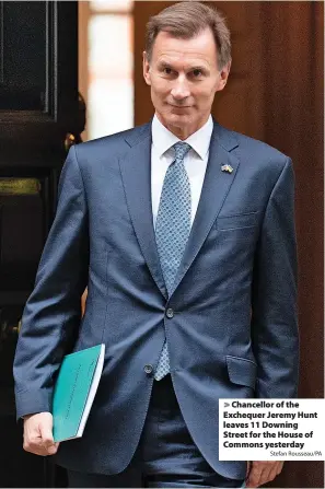  ?? Stefan Rousseau/PA ?? > Chancellor of the Exchequer Jeremy Hunt leaves 11 Downing Street for the House of Commons yesterday