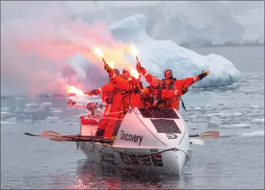  ?? DISCOVERY CHANNEL ?? Oakland school principal John Petersen, right, was among a six-man team that in December made the first-ever voyage in an open rowboat from South America to Antarctica. The trip across Drake Passage took the crew 12days.