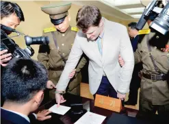  ??  ?? PYONGYANG: This file photo taken on March 16, 2016 shows the trial of US student Otto Frederick Warmbier, who was arrested for committing hostile acts against North Korea, at the Supreme Court. — AFP