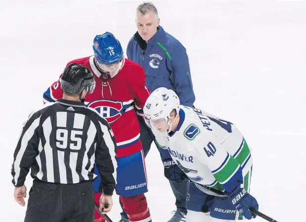  ?? — THE CANADIAN PRESS FILES ?? Montreal’s Jesperi Kotkaniemi shows his concern for Canucks’ rookie centre Elias Pettersson after the two got tangled up in a game last Thursday. The collision led to a mild sprain of the medial collateral ligament for the dynamic Swede.