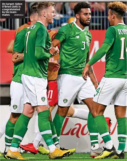  ?? SPORTSFILE ?? On target: Aiden O’Brien (left) is congratula­ted by his teammates