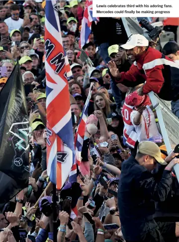  ?? ?? Lewis celebrates third with his adoring fans. Mercedes could finally be making progress