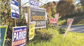  ?? PAT FURGURSON / CAPITAL GAZETTE ?? What to do with all those campaign signs? One group is recycling them. This cluster was still up on the Broadneck peninsula on Thursday.