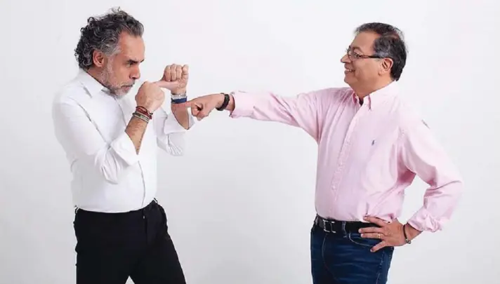 ?? ?? ► Armando Benedetti y Gustavo Petro, en una sesión fotográfic­a.