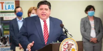  ?? ANTHONY VAZQUEZ/SUN-TIMES FILE ?? Gov. J.B. Pritzker answers questions during a July news conference.