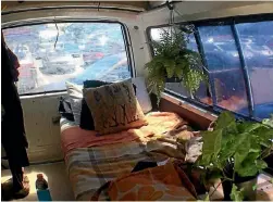  ??  ?? Inside Sheard’s mobile home were all the typical student comforts, including potted plants.