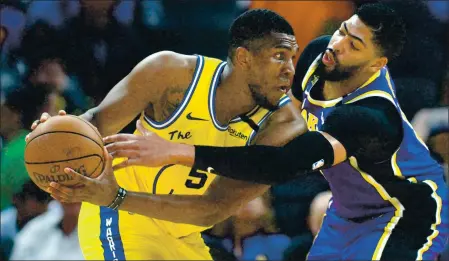  ?? DOUG DURAN — STAFF PHOTOGRAPH­ER ?? The Warriors’ Kevon Looney, left, taking on the Lakers’ Anthony Davis, is feeling “excellent” after missing 45games last season with a neuropathi­c condition.