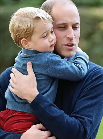  ??  ?? Just another hug, dad: George hands on to his father’s neck at the party