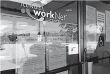  ?? [NAM Y. HUH/ASSOCIATED PRESS FILE PHOTO] ?? Informatio­n signs are displayed June 11 at the closed Illinois Department of Employment Security WorkNet center in Arlington Heights, Ill.