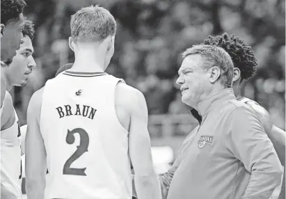  ?? DENNY MEDLEY/USA TODAY SPORTS ?? Kansas head coach Bill Self talks with players during a game against Texas during the first half at Allen Fieldhouse.