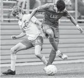  ??  ?? Rockwall-heath’s Brock Bernard, left, and Sanchez battle for the ball. Bernard later received a red card along with LEE goalkeeper Joey Batrouni.