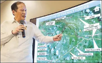  ?? BOY SANTOS ?? Former president Benigno Aquino III presents a slide show on the SAF operation in Mamasapano during a press conference at his residence on Times street in Quezon City yesterday.