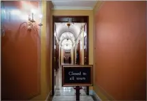  ?? AP PHOTO BY J. SCOTT APPLEWHITE ?? A closed corridor adjacent to the offices of Senate Majority Leader Mitch Mcconnell of Ky., leads to the Strom Thurmond Room on Hill Capitol in Washington, Monday, where the GOP health care bill has been written.