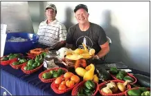  ?? Courtesy photo ?? Soul’s Harbor residents sell the harvest from the organizati­on’s garden at the Rogers Farmers Market. “From our very own garden, we harvest tomatoes, beets, carrots, squash, kale, collards, herbs, peppers, and we just planted watermelon,” says...